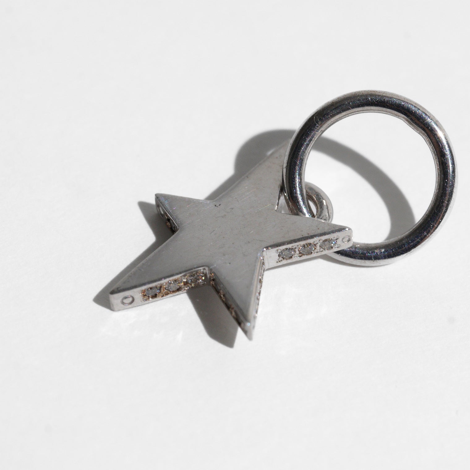 【an-other】Tiny star line stone charm (cubic zirconia)