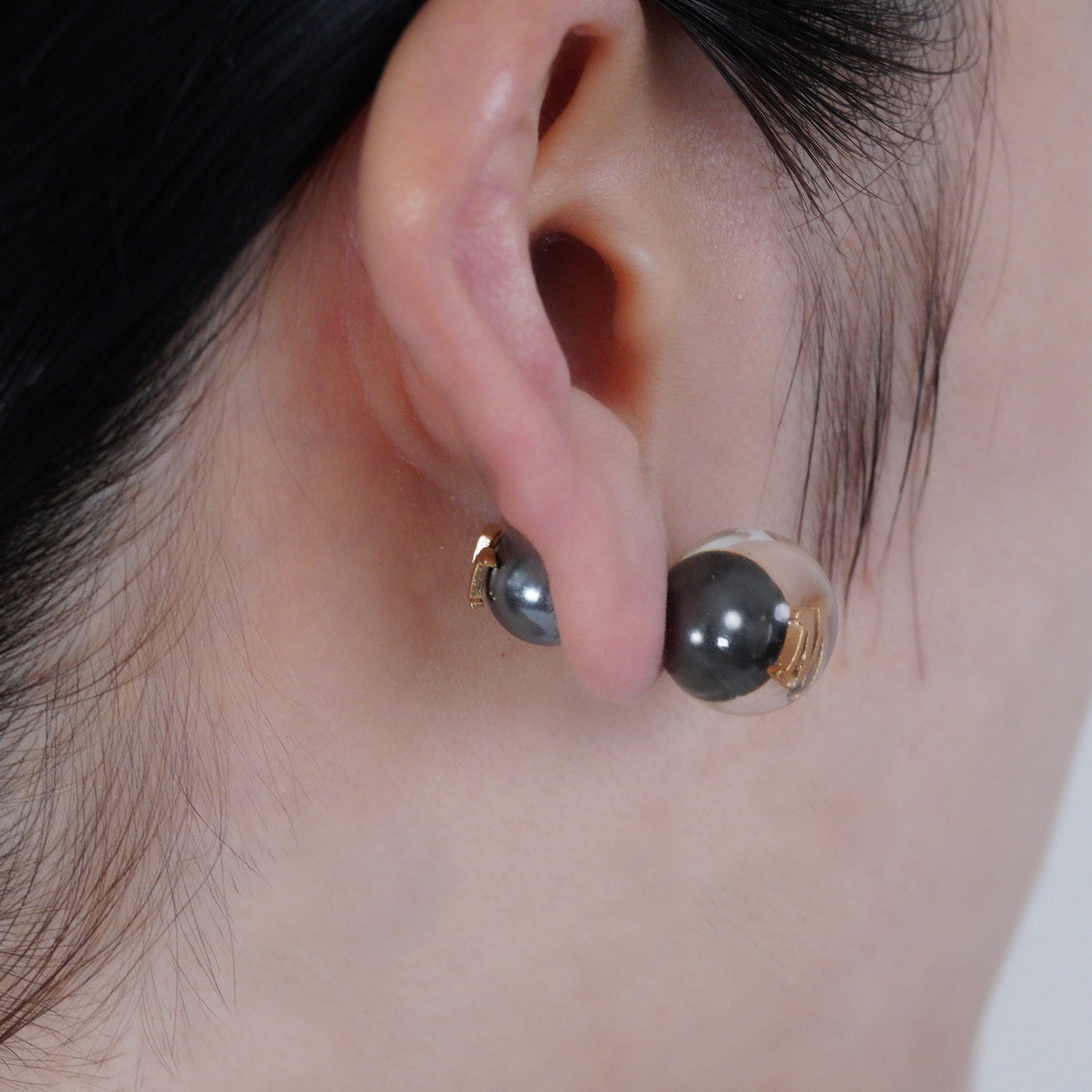 Initial inclusion pierce (black)