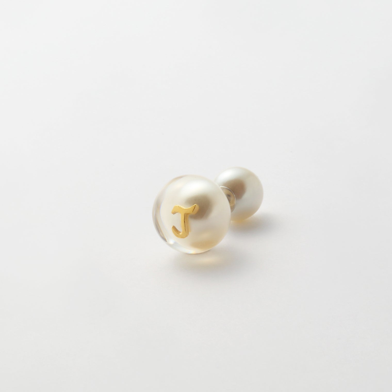 Initial inclusion pierce (white)