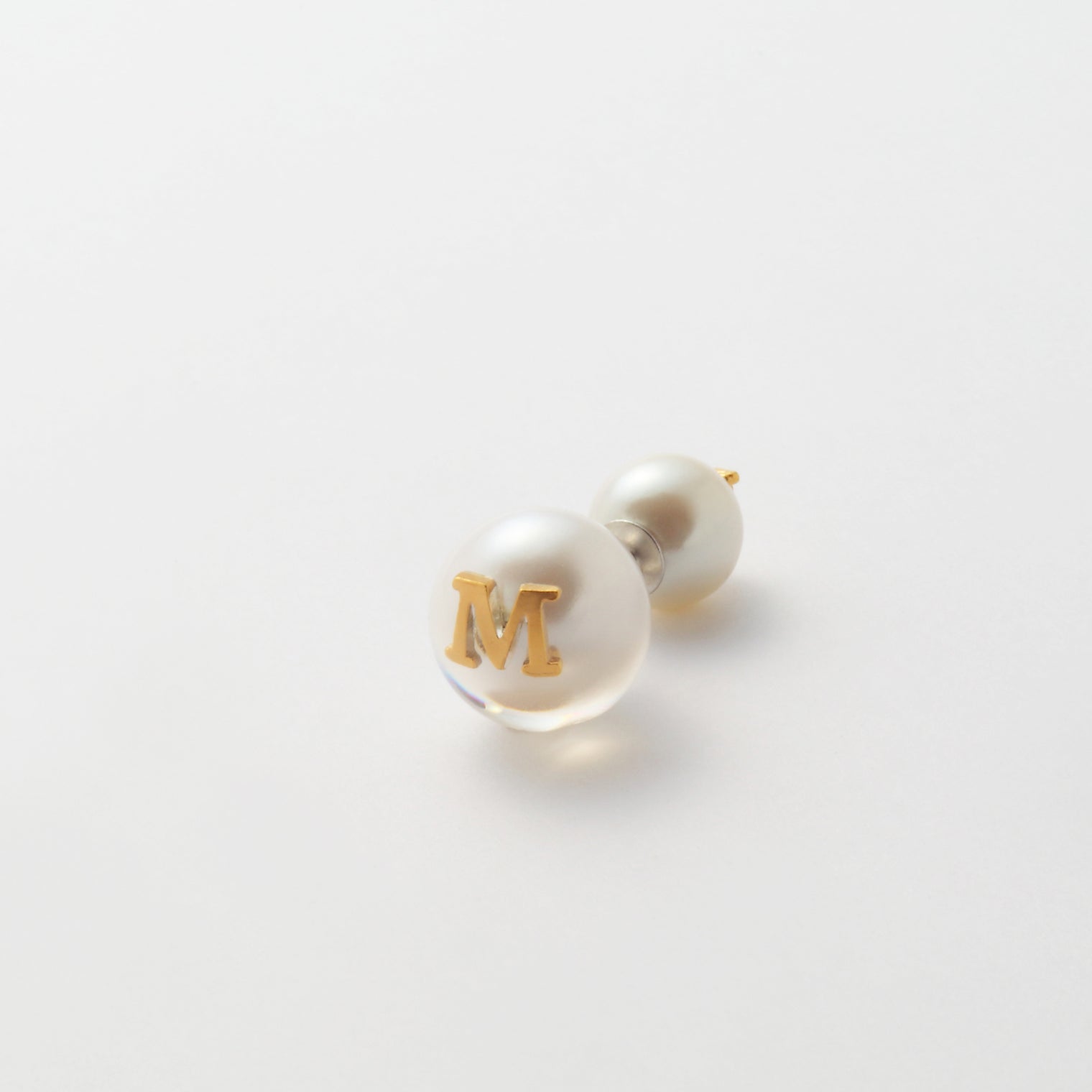Initial inclusion pierce (white)