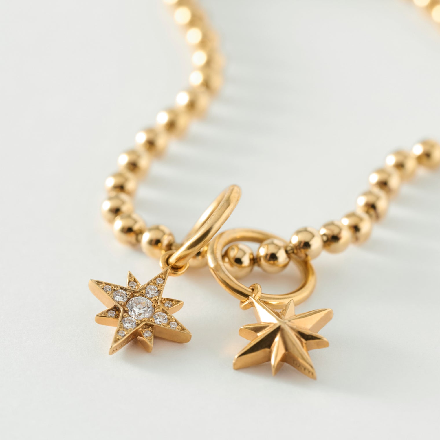 little star charm (reversible / gold / cubic zirconia)
