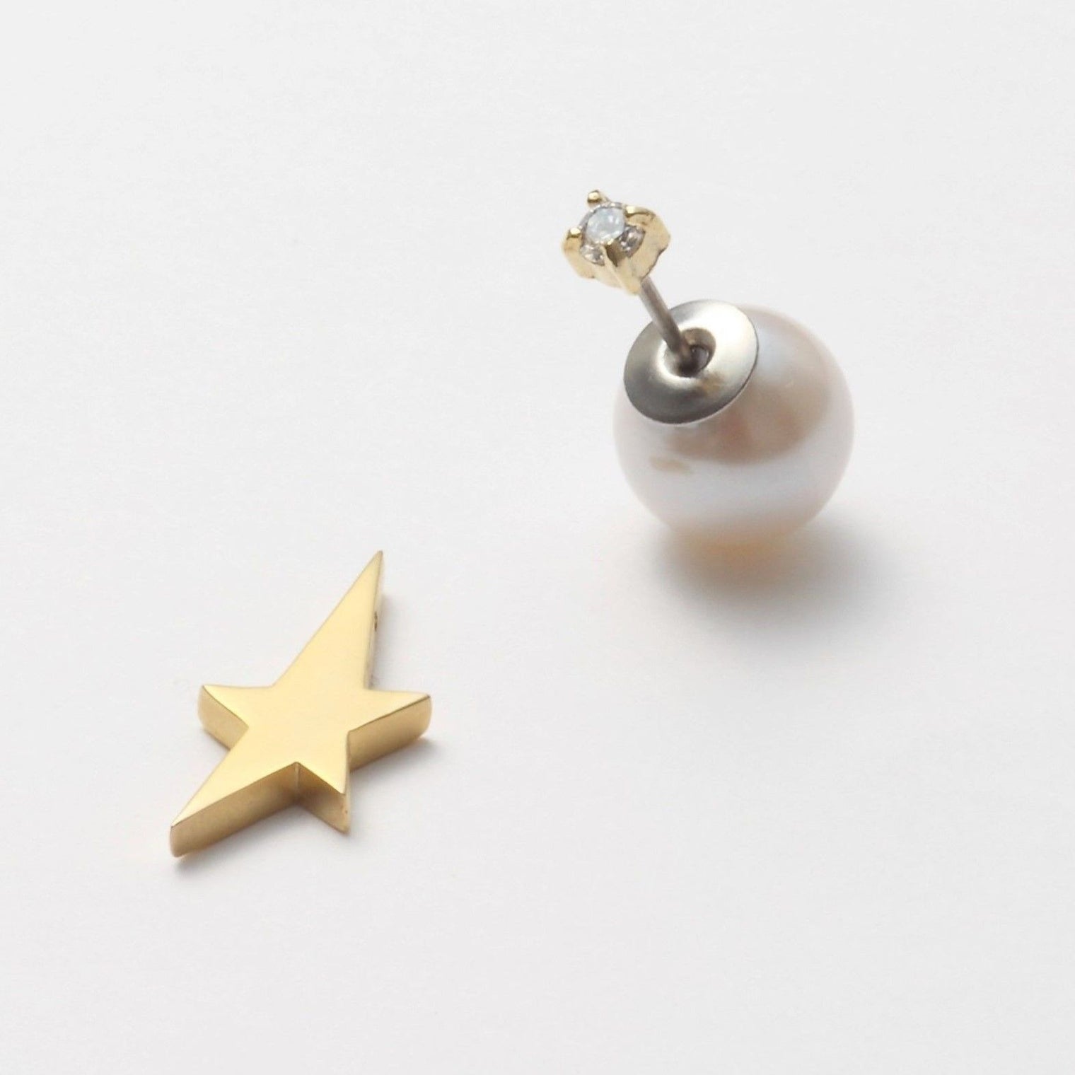 2way star pierce (vertical type/cubic zirconia/9mm pearl catch)