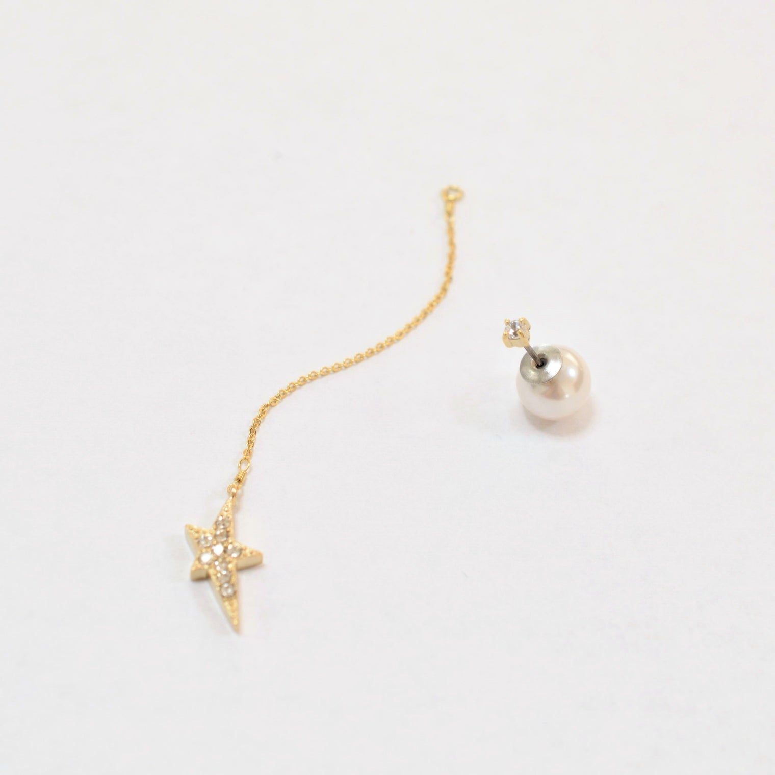 2way star long chain pierce(1cubiczirconia/crystal glass/9mm pearl catch)