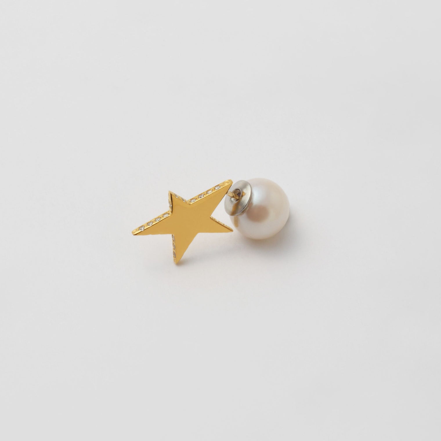 Tiny star line stone pierce (gold / cubic zirconia / pearl clasp)
