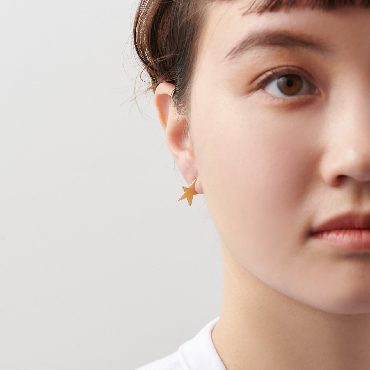 Tiny star line stone pierce (gold / cubic zirconia / shine gold tube clasp)