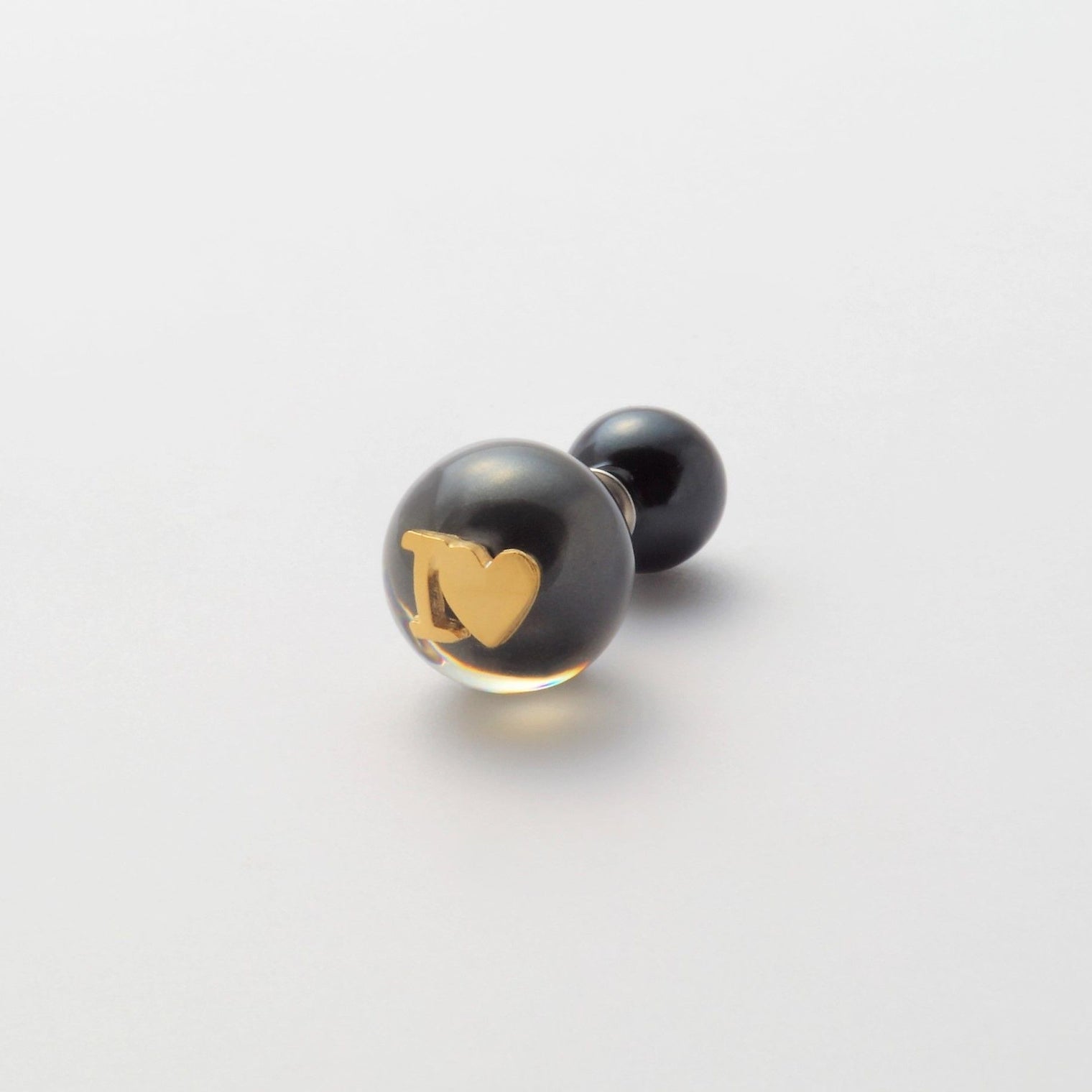 Initial inclusion pierce (black)