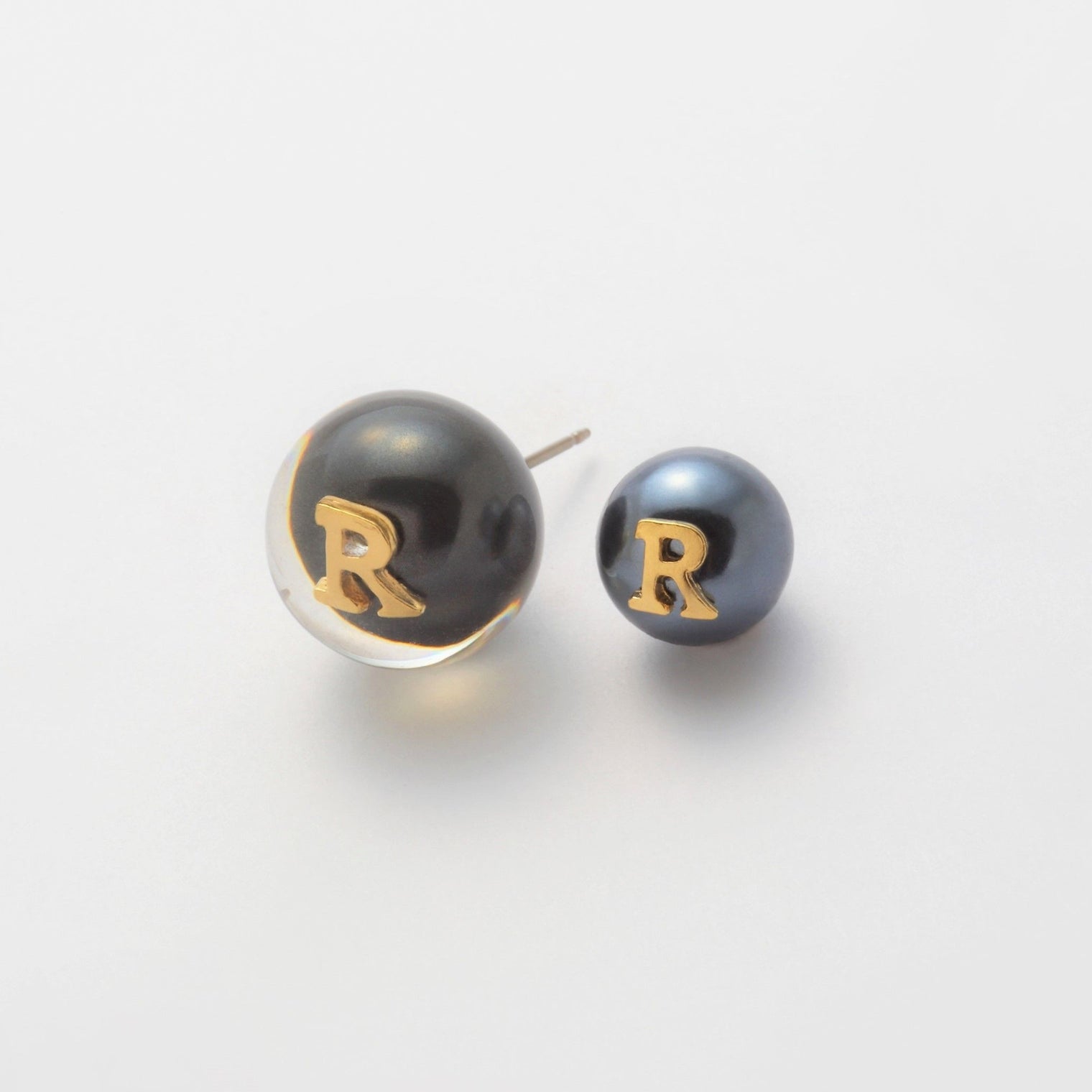 Initial inclusion pierce (black)