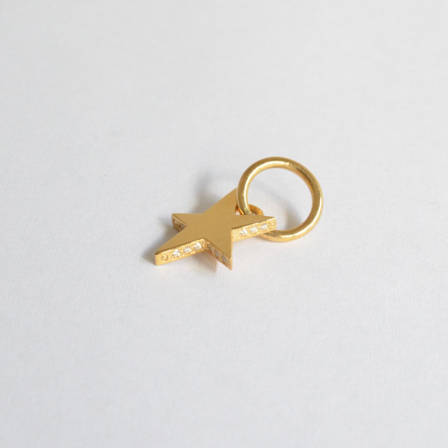Tiny star line stone charm (cubic zirconia)
