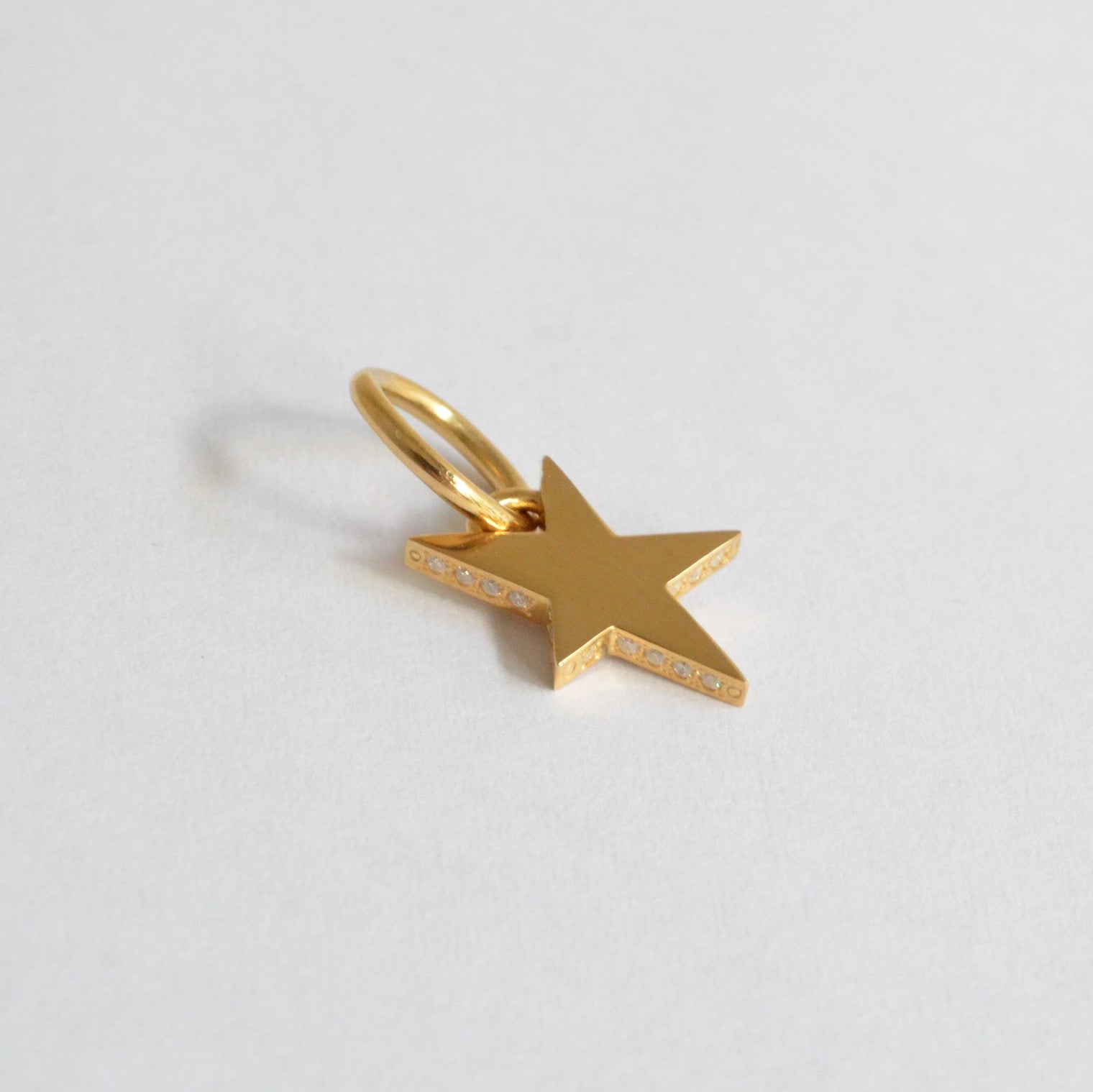 Tiny star line stone charm (cubic zirconia)