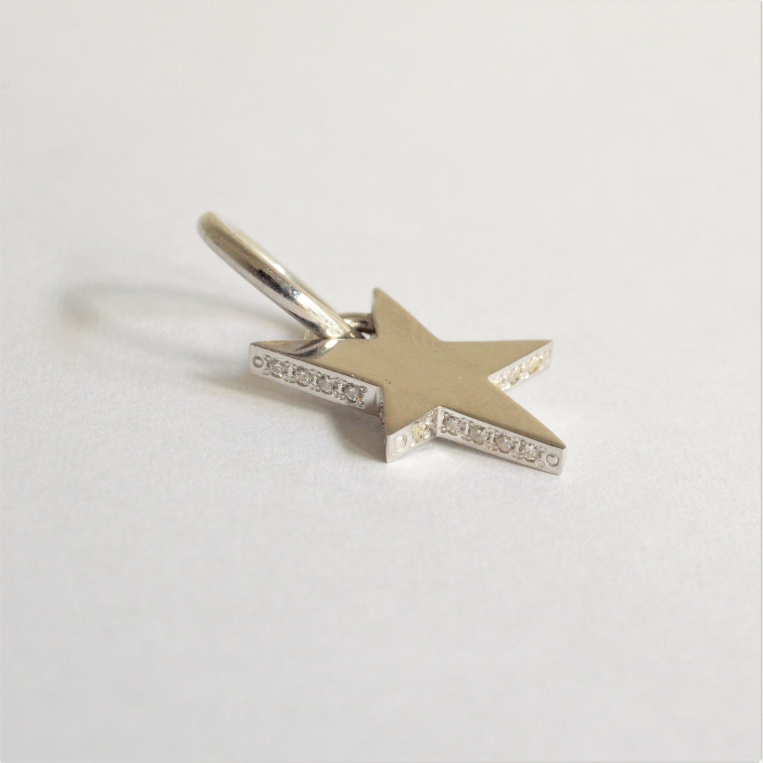 Tiny star line stone charm (cubic zirconia)