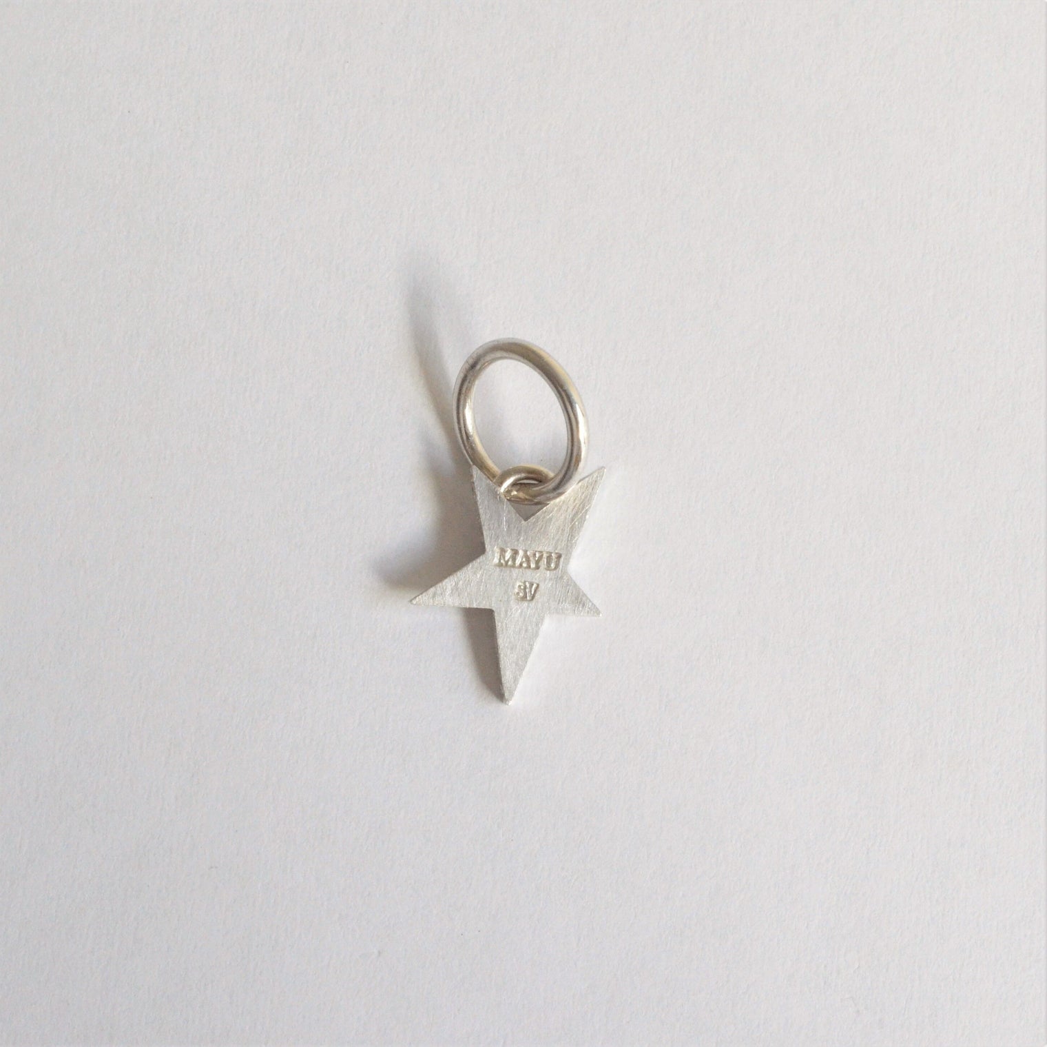 Tiny star line stone charm (cubic zirconia)
