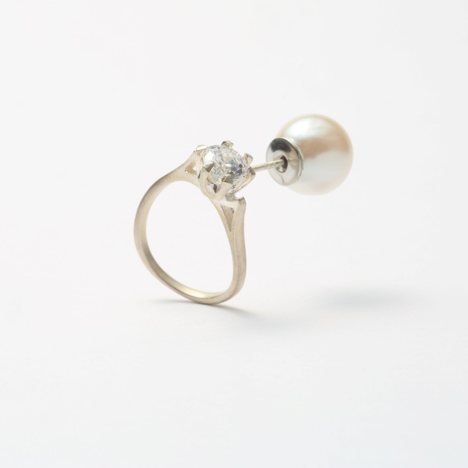 ring motif pierce (cubic zirconia / silver/ front)