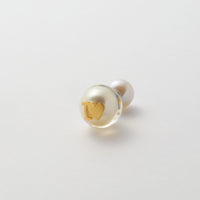 Initial inclusion pierce (white)