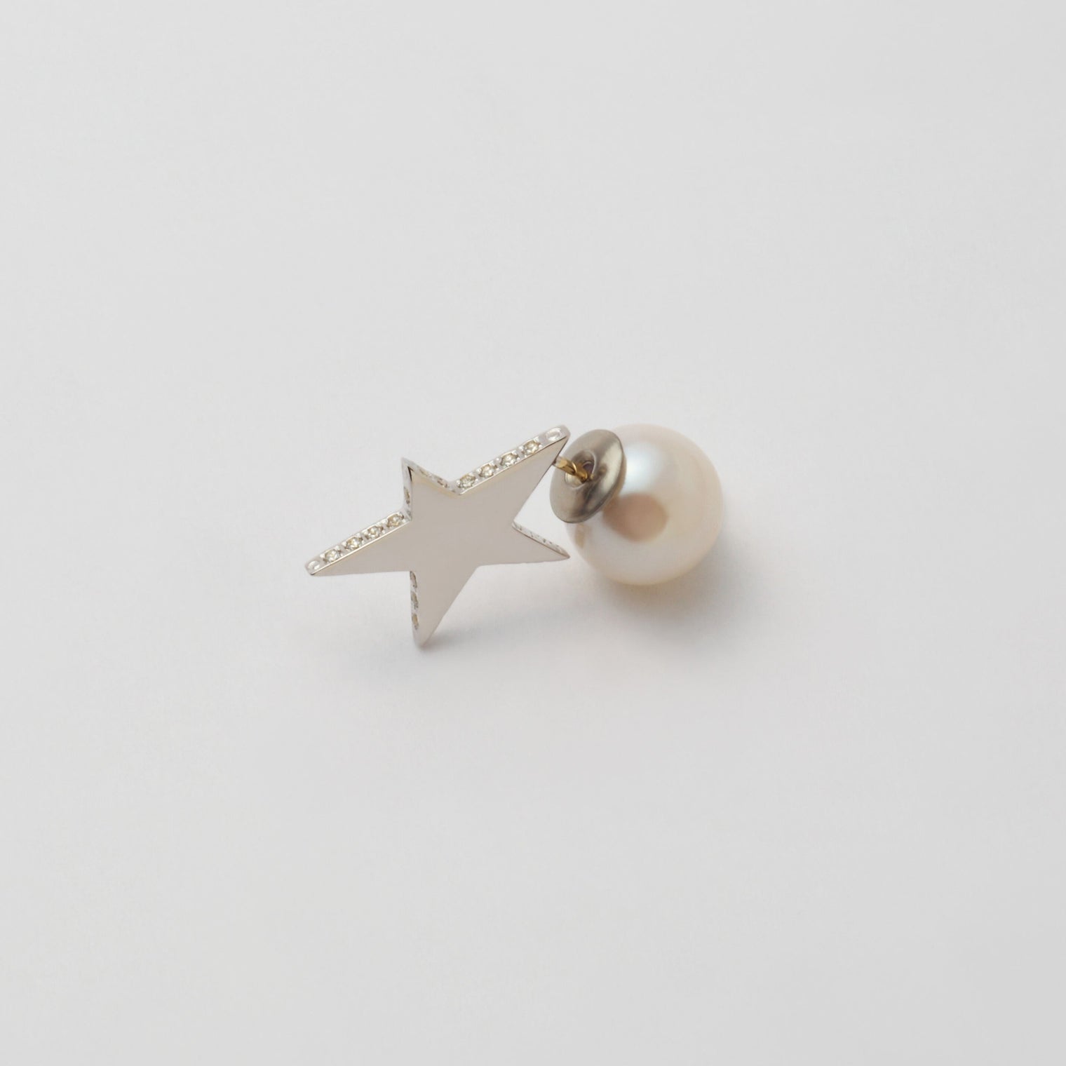 Tiny star line stone pierce (silver / cubic zirconia / pearl clasp)