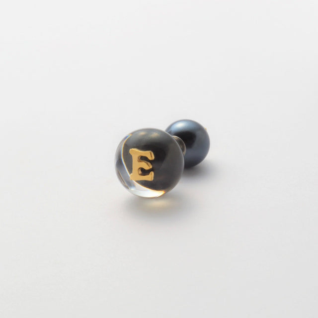 Initial inclusion pierce (black)