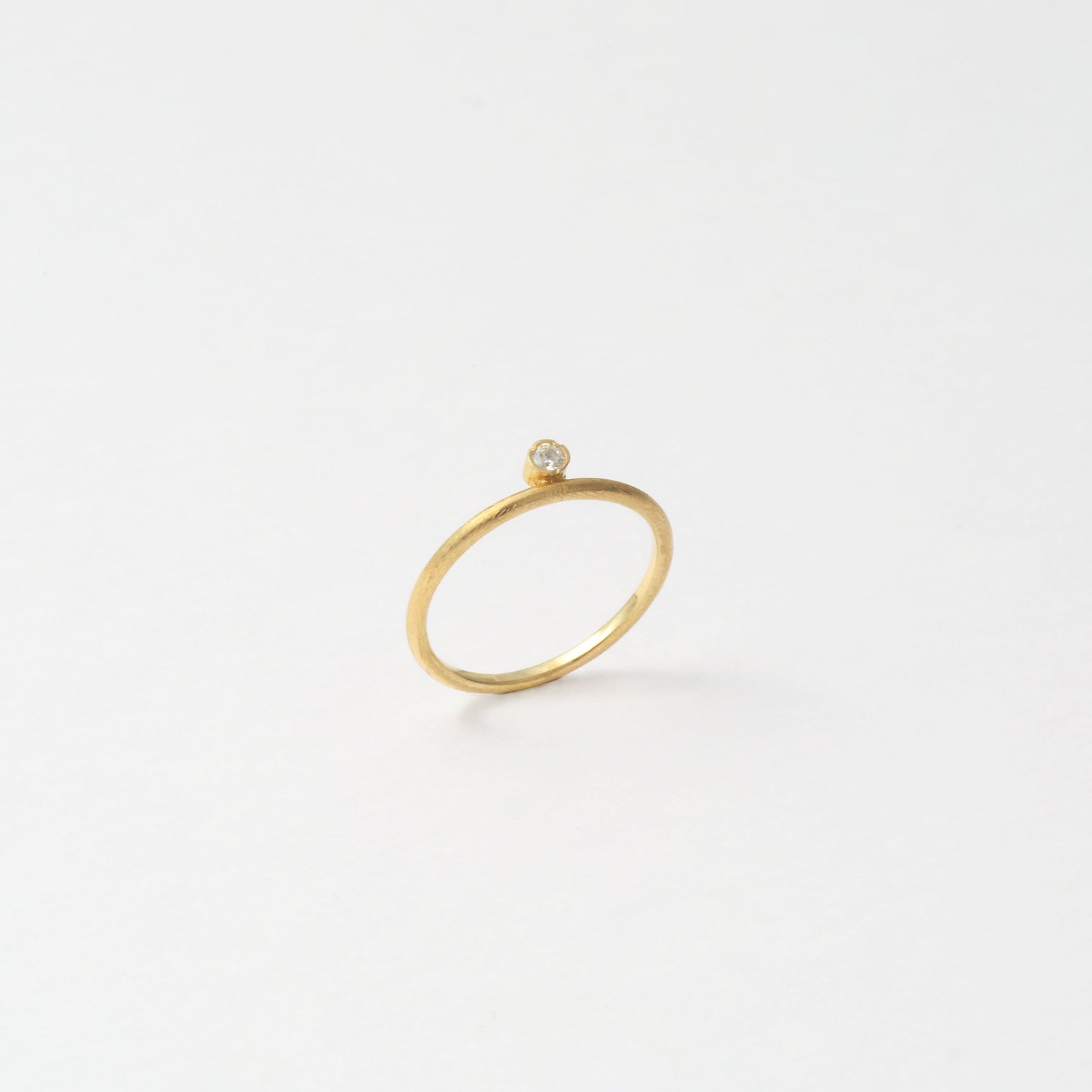 stone pinky ring (cubic zirconia/gold)